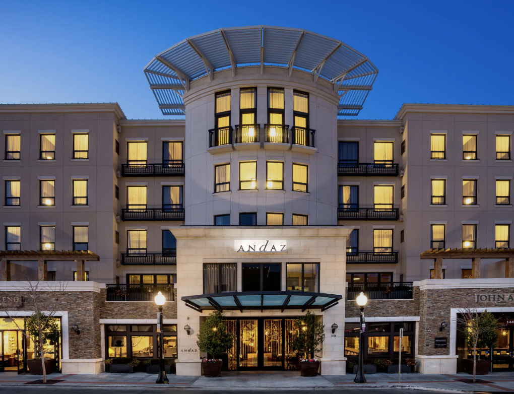 The Andaz Napa Valley hotel exterior illuminated at dusk